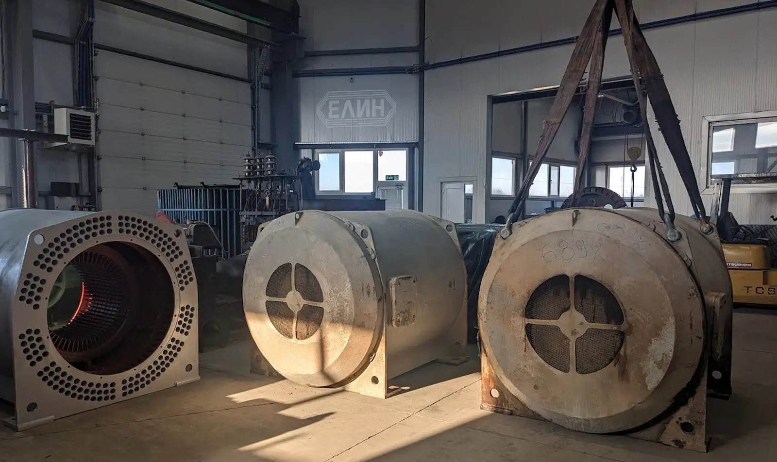 Large industrial electrical machines inside the ELIN Engineering repair workshop